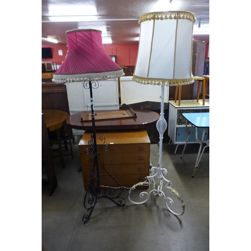 322 - A Victorian wrought iron and copper telescopic standard lamp and a painted standard lamp