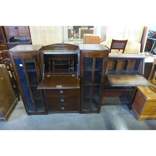 335 - An oak side by side bureau bookcase and a student's bureau