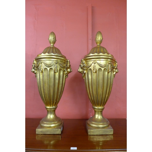 34 - A pair of large George III style gilt urns and covers, 88cms h    (20038898)   #