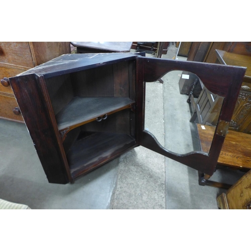 342 - An Edward VII mahogany hanging corner cabinet