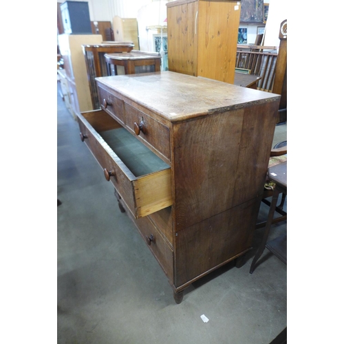 343 - A George III oak chest of drawers