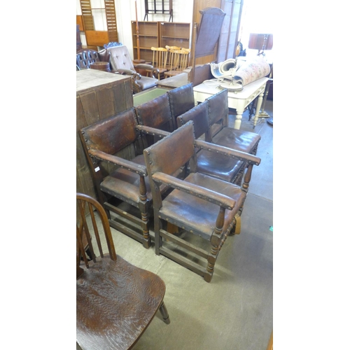 355 - A set of six oak and leather upholstered chairs