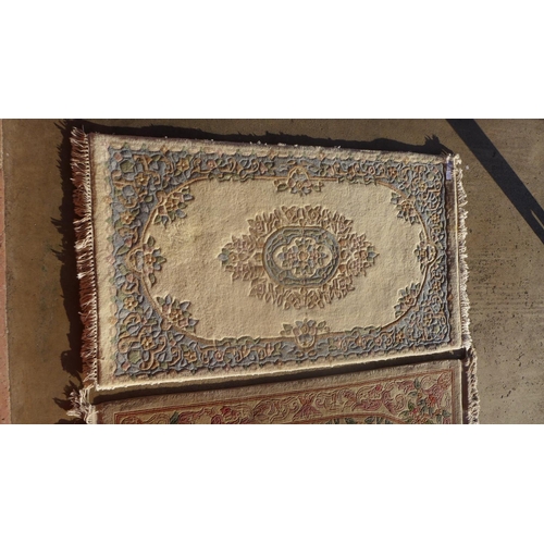 358 - Two Chinese rugs, 170 x 93cms and 163 x 89cms