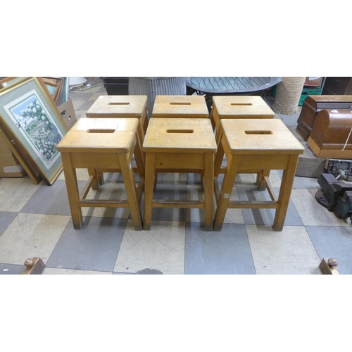 368 - A set of six beech laboratory stools