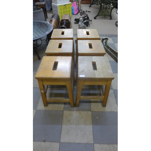 368 - A set of six beech laboratory stools