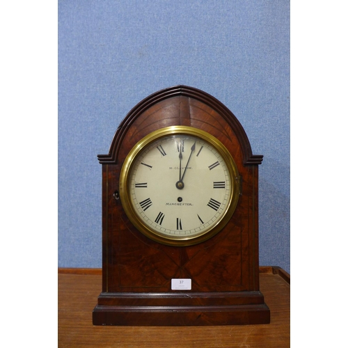 37 - A George IV mahogany lancet shaped bracket clock, the painted dial signed M. Clayton, Manchester, 46... 