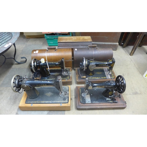 372 - Two cased Singer sewing machines and two others