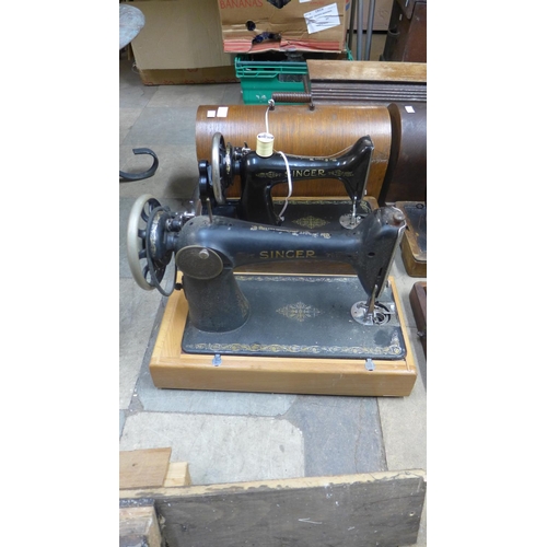 372 - Two cased Singer sewing machines and two others