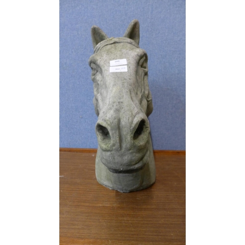 388 - A concrete horse's head