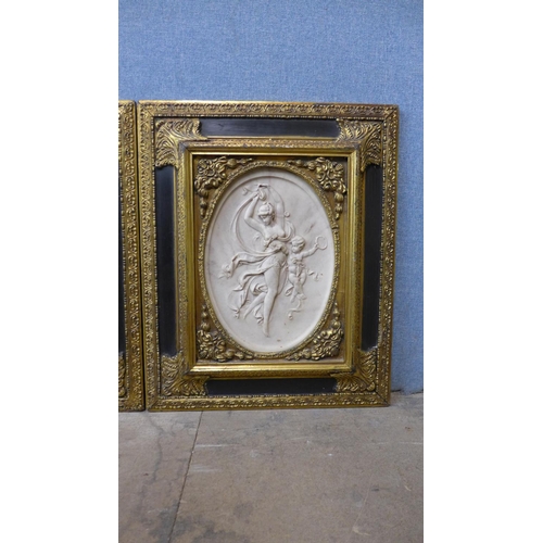 398 - A pair of faux marble relief plaques, manner of J.P Darbien, framed