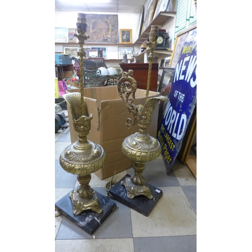 424 - A pair of rococo style brass and marble based table lamps, one a/f