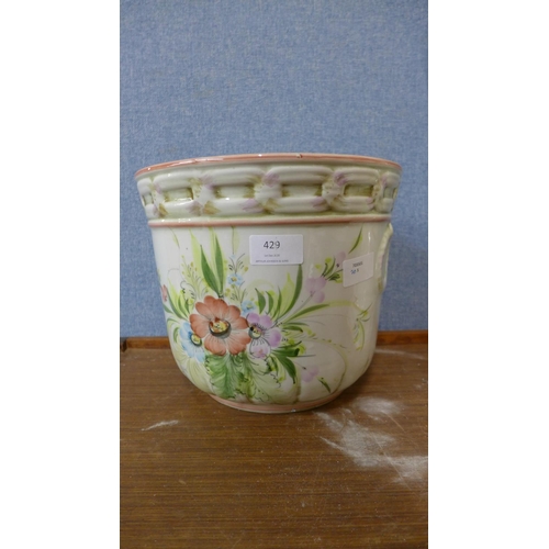 429 - A Portuguese porcelain jardiniere and stand