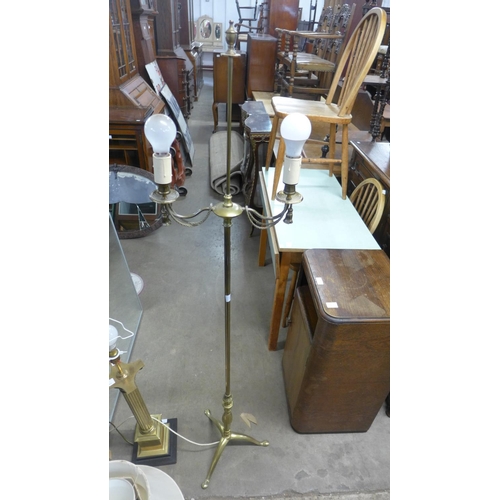 435 - A brass Corinthian column table lamp and a brass Neo-Classical style standard lamp