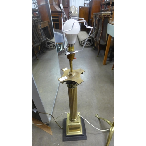 435 - A brass Corinthian column table lamp and a brass Neo-Classical style standard lamp