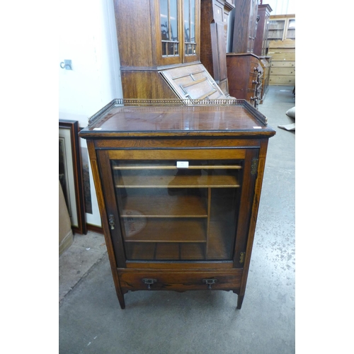 55 - A Victorian inlaid rosewood music cabinet, 89cms h, 61cms w, 38cms d