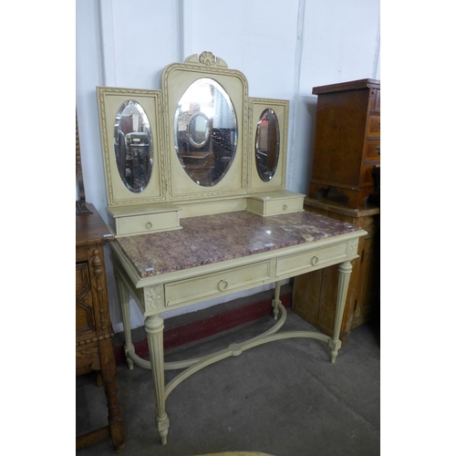 69 - A French cream and marble topped lady's dressing table, 135cms h, 106cms w, 58cms d