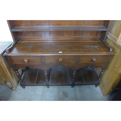 73 - A Victorian stained pine dresser, 207cms h, 152cms w, 47cms d