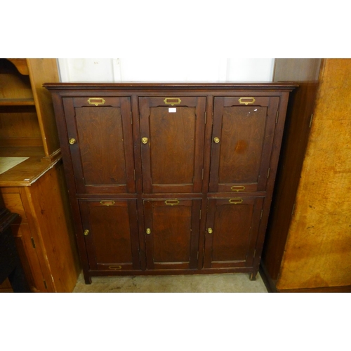 77 - A Victorian stained pine and beech six door locker cabinet, 137cms h, 132cms w, 40cms d