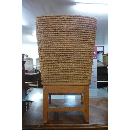 81 - An Orkney pine and straw work child's chair, 83cms h x 54cms w