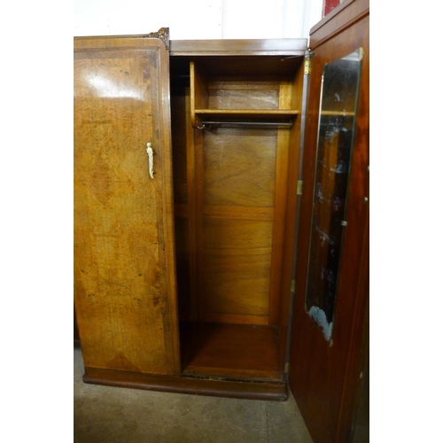 82 - A 1930's burr walnut wardrobe, 187cms h, 119cms w, 54cms d