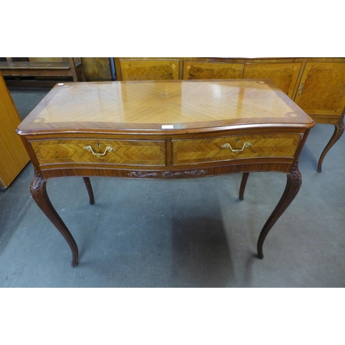 83 - An Epstein style mahogany and burr walnut serpentine sideboard, 92cms h, 161cms w, 55cms d and a pai... 