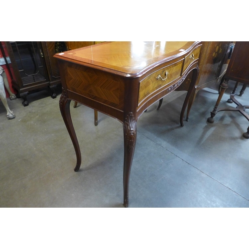 83 - An Epstein style mahogany and burr walnut serpentine sideboard, 92cms h, 161cms w, 55cms d and a pai... 