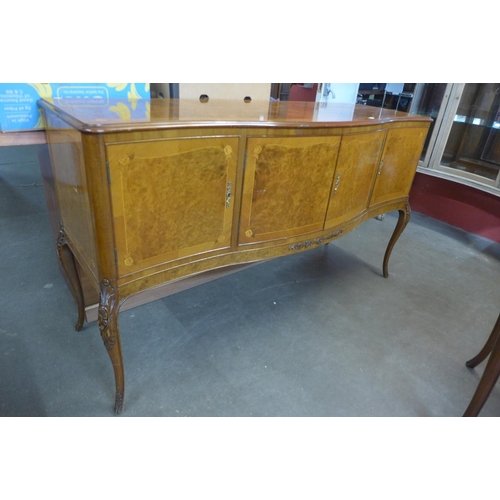 83 - An Epstein style mahogany and burr walnut serpentine sideboard, 92cms h, 161cms w, 55cms d and a pai... 