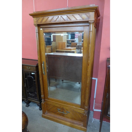 87 - A 19th Century French pitch pine armoire, 194cms h, 97cms w, 50cms d