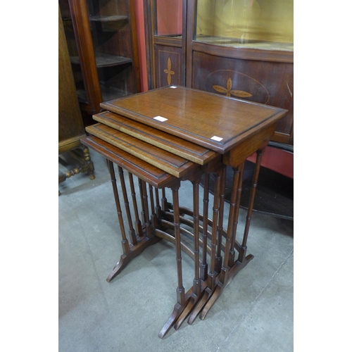 91 - An Edward VII mahogany nest of quartetto tables, 70cms h x 49cms w