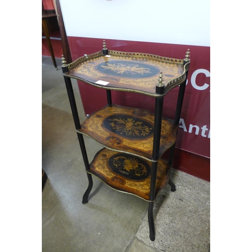 97 - A 19th Century French rosewood, ebonised and marquetry inlaid three tier etagere, 80cms h