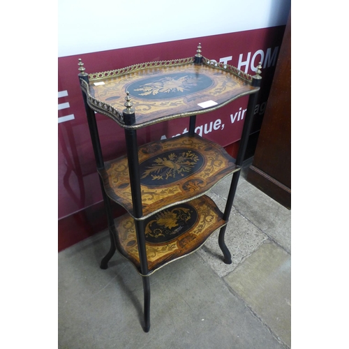 97 - A 19th Century French rosewood, ebonised and marquetry inlaid three tier etagere, 80cms h