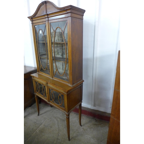 438 - An Edward VII inlaid mahogany display cabinet, 203cms h, 92cms w, 39cms d