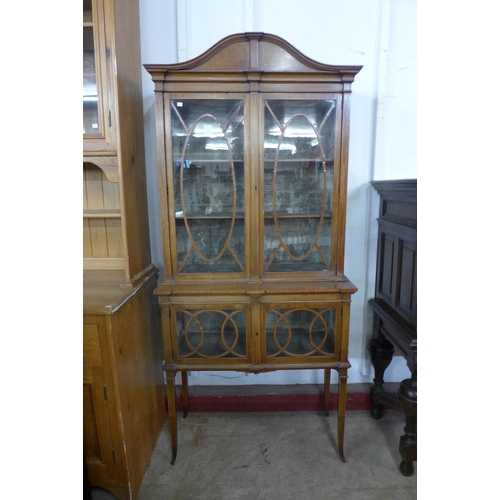 438 - An Edward VII inlaid mahogany display cabinet, 203cms h, 92cms w, 39cms d