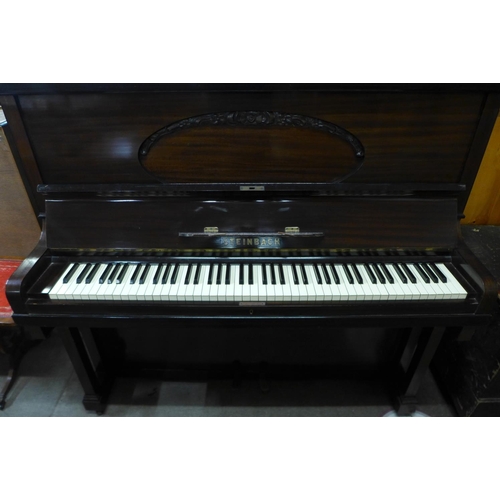 440 - An early 20th Century Steinbach mahogany overstrung upright piano