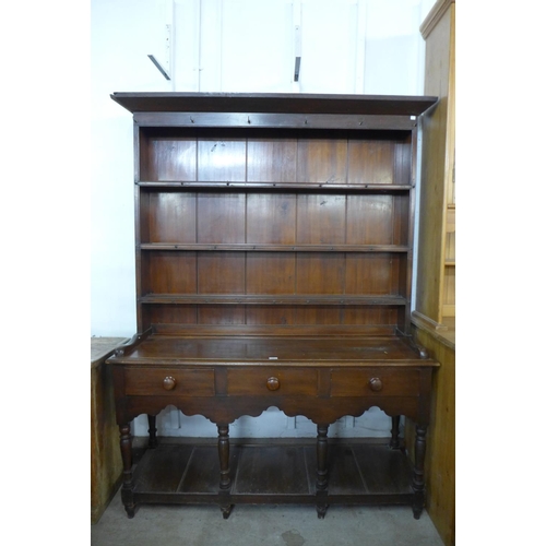 45 - A Victorian stained pine dresser, 207cms h, 152cms w, 47cms d