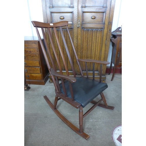 103 - An afromosia rocking chair