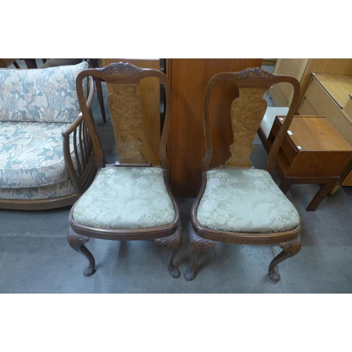 205 - A pair of George l style walnut side chairs