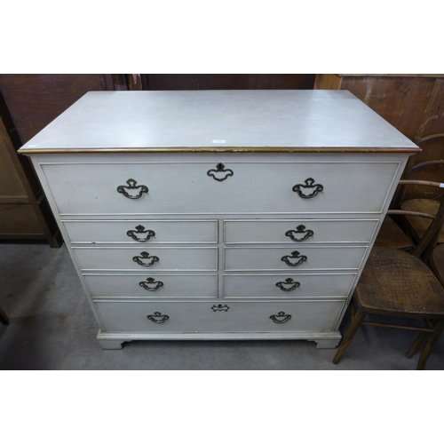 219 - A George III painted oak chest of drawers (top adapted to lift up)