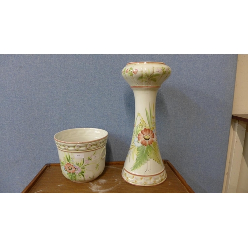 400 - A blue and white porcelain vase, two jardinieres on stands and three light shades