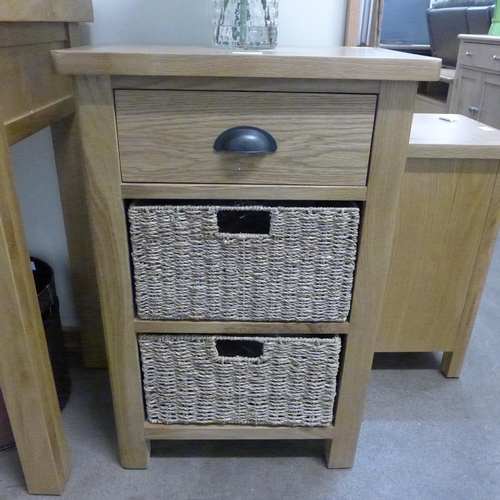 1384 - A Rutland oak one drawer two basket cabinet ref 52 * this lot is subject to VAT slight damage to top... 