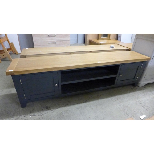 1420 - An oak and blue large TV stand  *This lot is subject to VAT