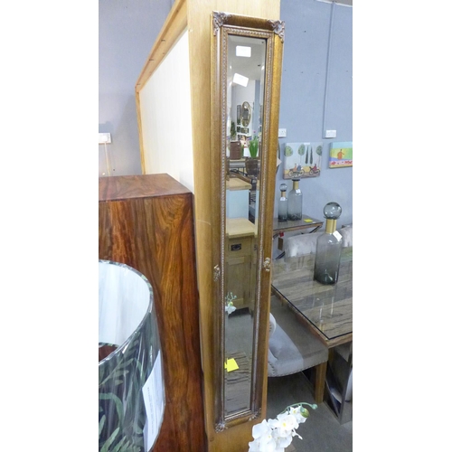 1488 - A slim gilt wall mirror (1534020)   #