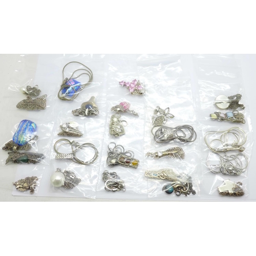 1004 - Twenty-five silver pendants and chains