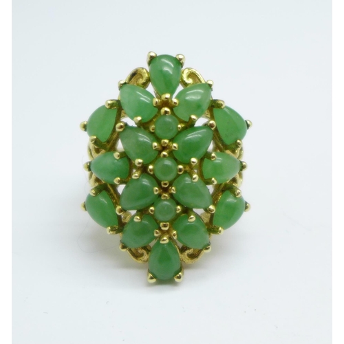 1012 - A silver gilt and green coloured stone ring, P