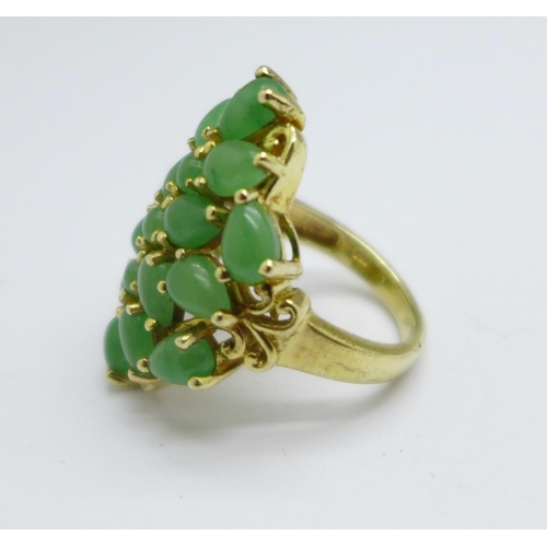 1012 - A silver gilt and green coloured stone ring, P