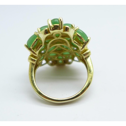 1012 - A silver gilt and green coloured stone ring, P