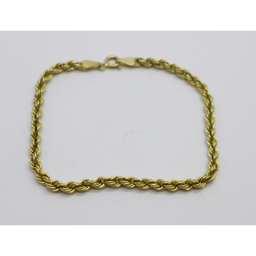 1033 - A 9ct gold rope bracelet, 2g, 18cm