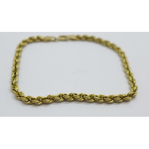 1033 - A 9ct gold rope bracelet, 2g, 18cm