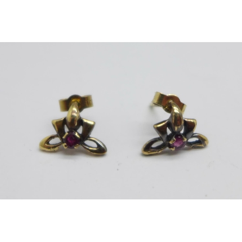 1045 - A pair of yellow metal and red stone earrings, the fasteners marked 9ct, 1.3g, (possibly adapted fro... 