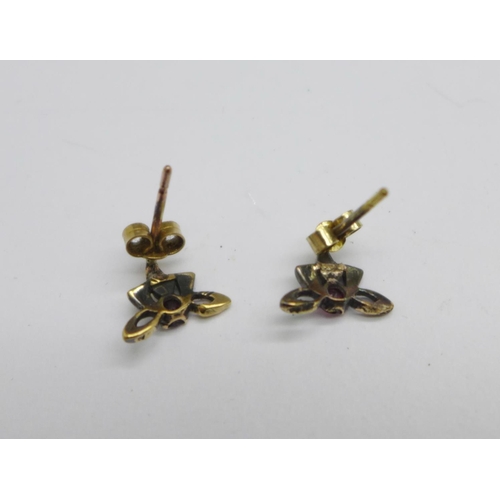 1045 - A pair of yellow metal and red stone earrings, the fasteners marked 9ct, 1.3g, (possibly adapted fro... 